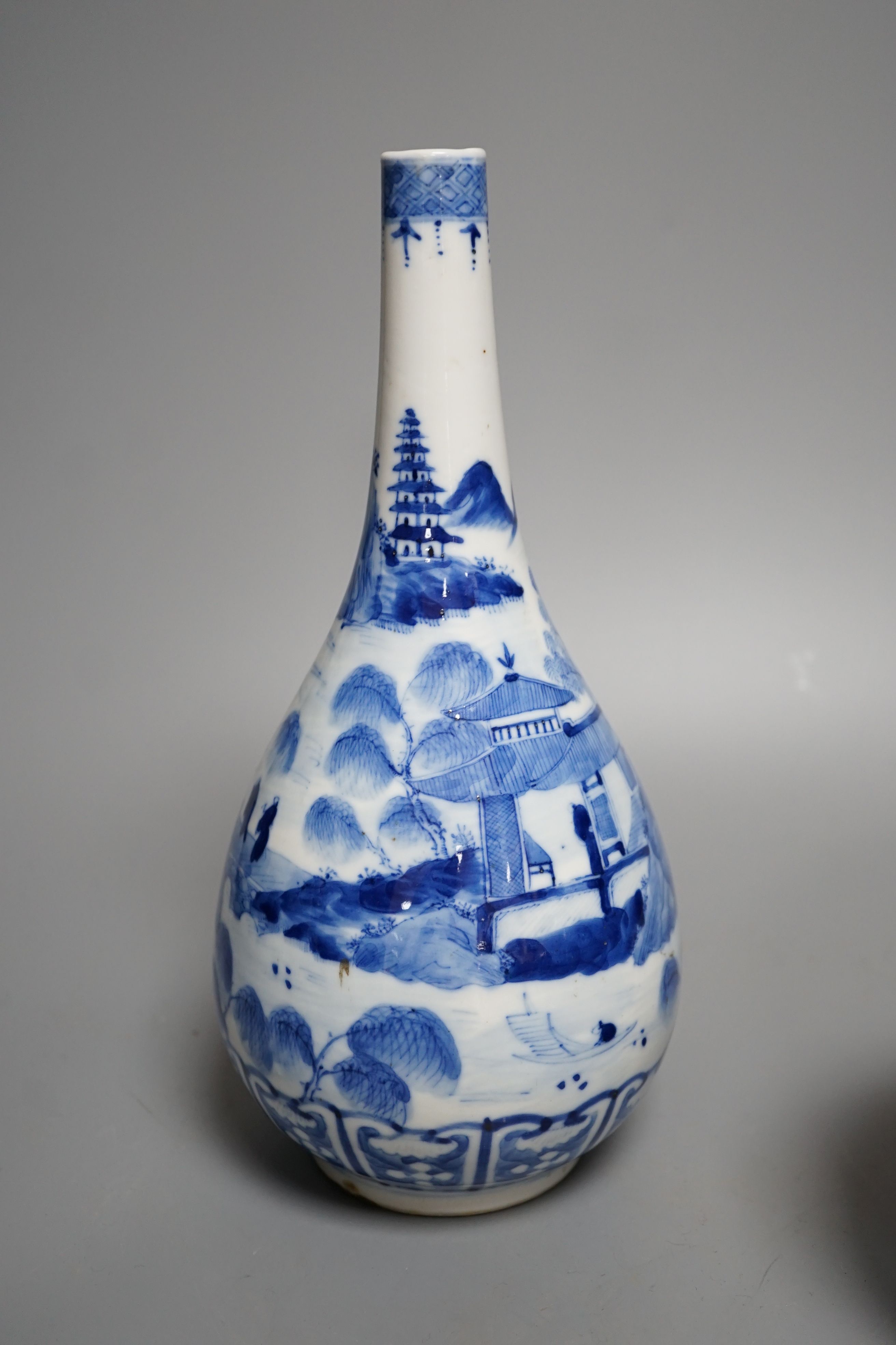 A Chinese blue and white vase and 3 graduated blue and white ginger jars, Vase25 cms high.